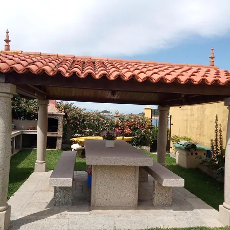 Casa Con Jardin En Primera Linea De Playa O Grove